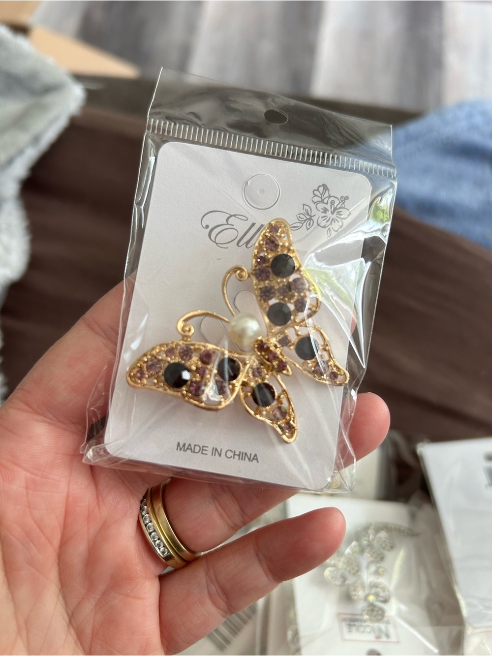 4/$50 Ellie Gold Butterfly Brooch with Black and Purple Accents